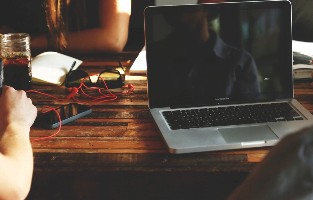 Laptop on a desk managing online marketplace listings