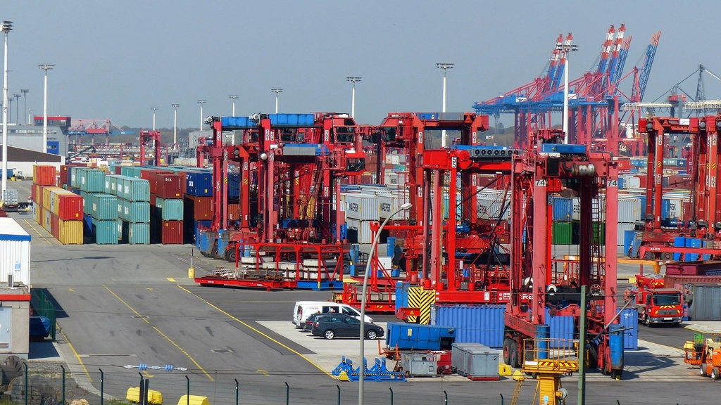 Container port with cranes handling shipments